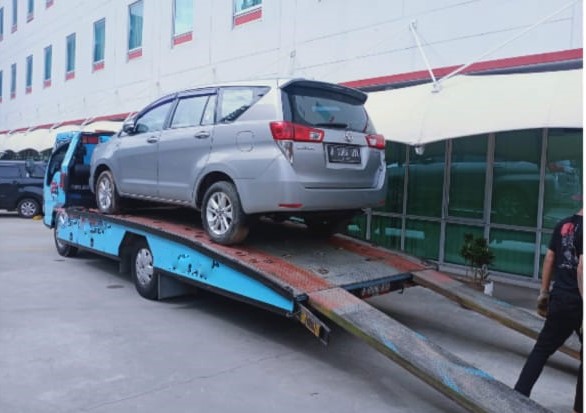Proses pengiriman unit mobil PT Ajinomoto Sales indonesia